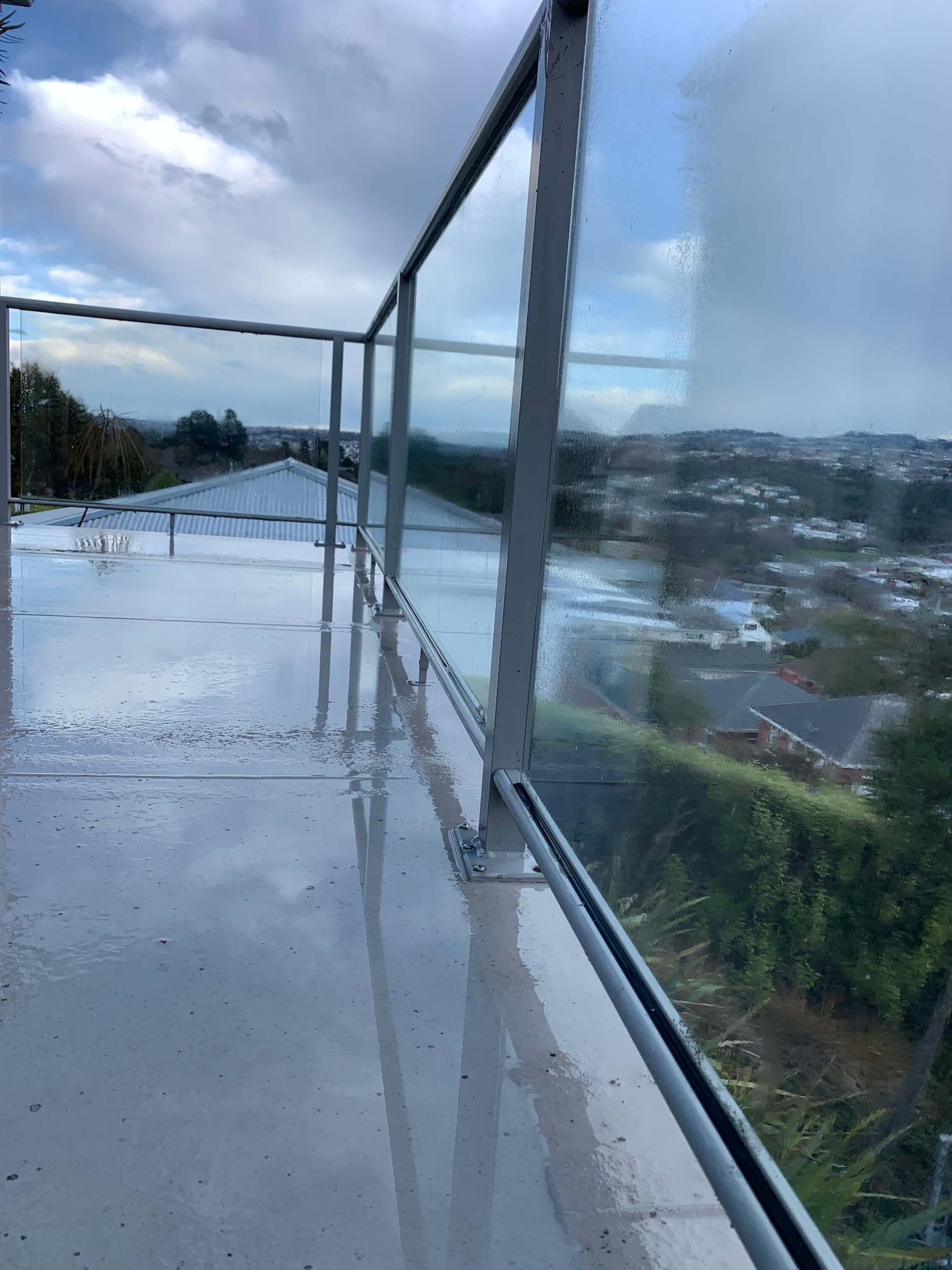 Clean and rejuvenated balcony after water blasting.